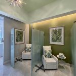 Spa clinic interior design - https://www.andyquinones.net Httpswww Andyquinones Net spa clinic vitamin iv treatment glass partitions with reclining white leather chairs artwork and sputnik chandelier